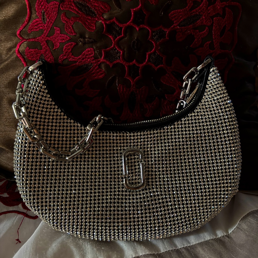 Like new crystal curve bag